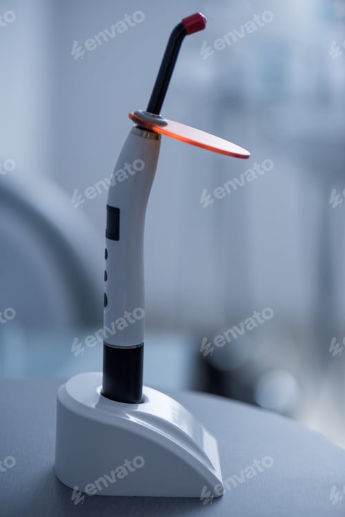 Preview: close up view of dental curing light in dentist office