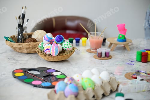 Preview: young family people making easter egg in holiday at home, decoration background