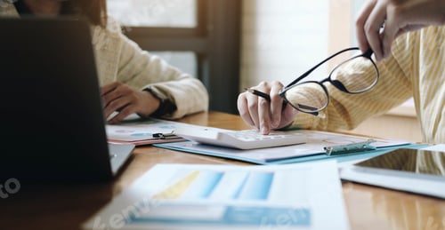 Preview: Asian business adviser meeting to analyze and discuss the situation on the financial report in the