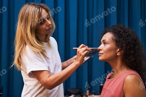 Preview: Profile photo of stylist doing professional makeup