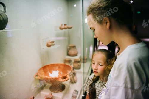 Preview: two girl looks at exhibits at the Archaeological Museum of Antalya, Turkey