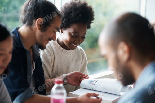 Preview: Heres a quick study tip...A group of college students sitting together and studying.
