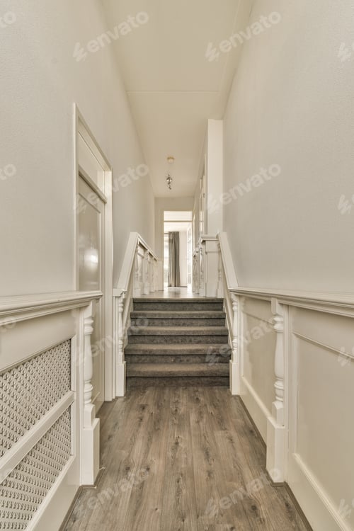 Preview: a large hallway with stairs and white walls and wood