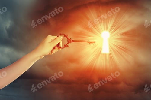 Preview: Close Up Image Of Human Hand Inserting Key In Key Hole