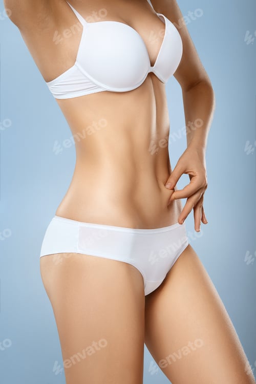 Vista previa: Unrecognizable woman in underwear testing fat layer on tummy