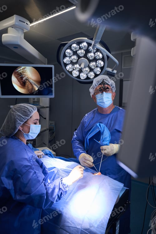 Preview: Surgeons Performing Delicate Operation in Hospital Operating Room