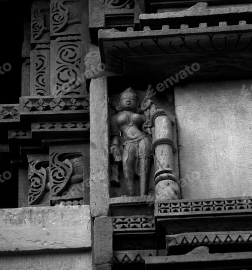 Preview: Sculpture of erotic woman on Khajuraho Temple.