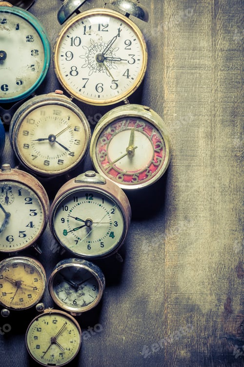 Preview: Old clocks in pile