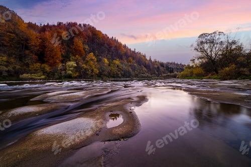 Preview: River rapids with autumn forests on banks