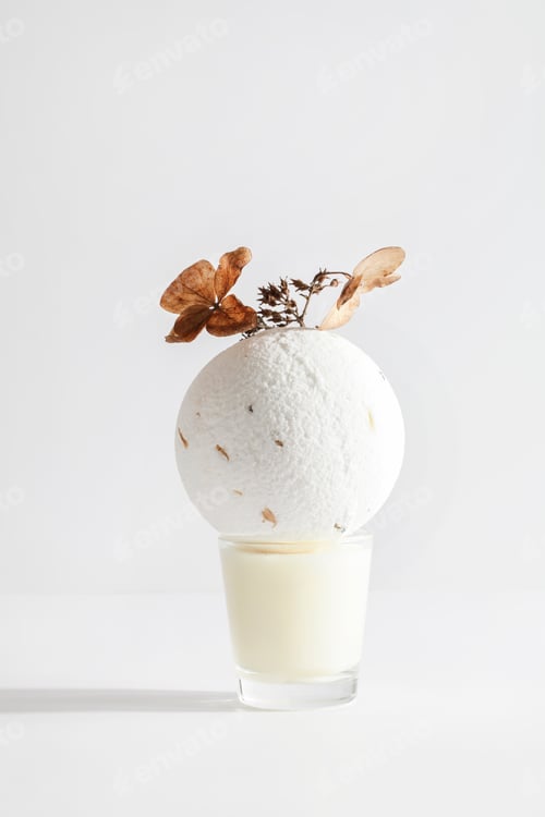 Preview: bath bomb on candle on white background. Still life for wall decoration in resort spa or salon. Spa,
