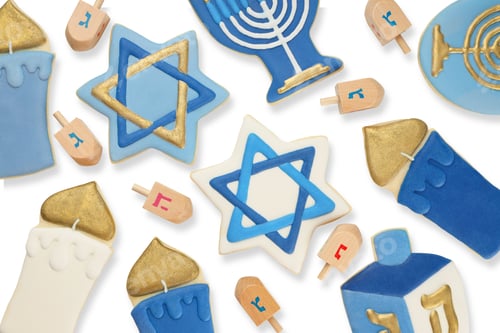 Preview: Blue and white Hanukkah dreidel and star cookies, on white