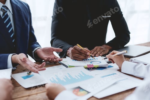 Preview: Business people meeting explaining the financial graph data and marketing plan.