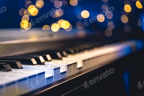 Preview: Piano keys close-up on a blurred background with bokeh.