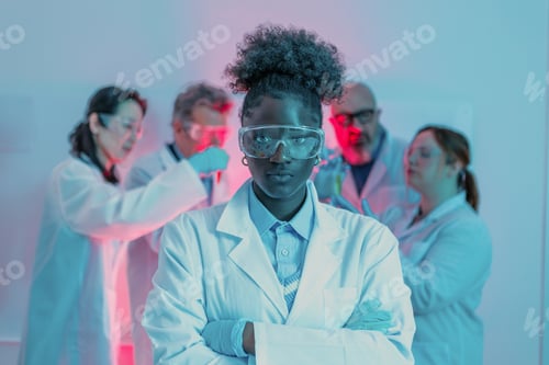 Preview: Confident young black woman scientist leading research team