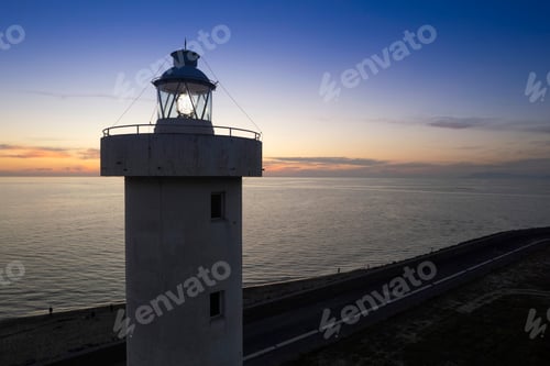 Preview: Aerial view of a maritime lighthouse taken at night