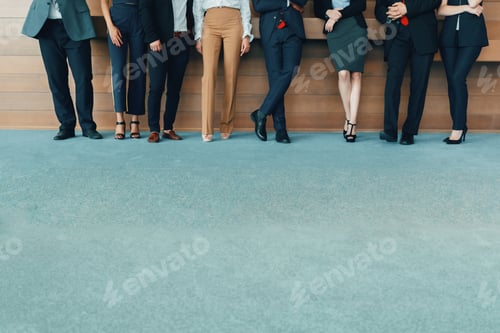 Preview: Successful team of young perspective businesspeople in office