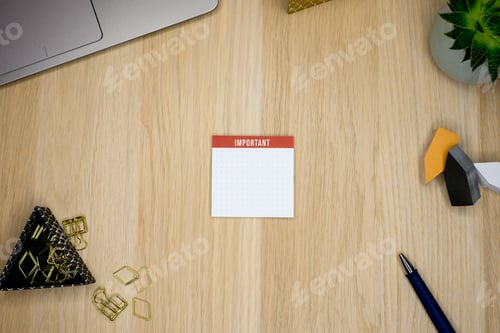 Preview: Top view of a notepad for important notes on a cluttered office desk