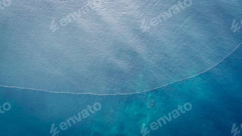 Preview: Aerial drone view of beautiful sea wave surface in the sunrise