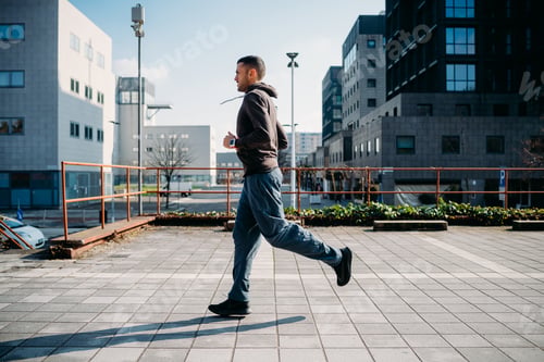 Preview: young man running outdoor training in the city