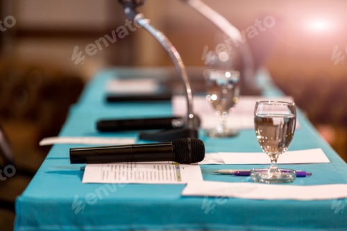 Preview: Microphone in concert hall or conference room soft and blur style for background.