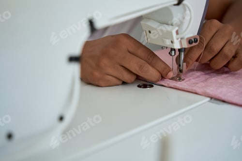 Preview: Male tailor making bespoken clothes in own atelier