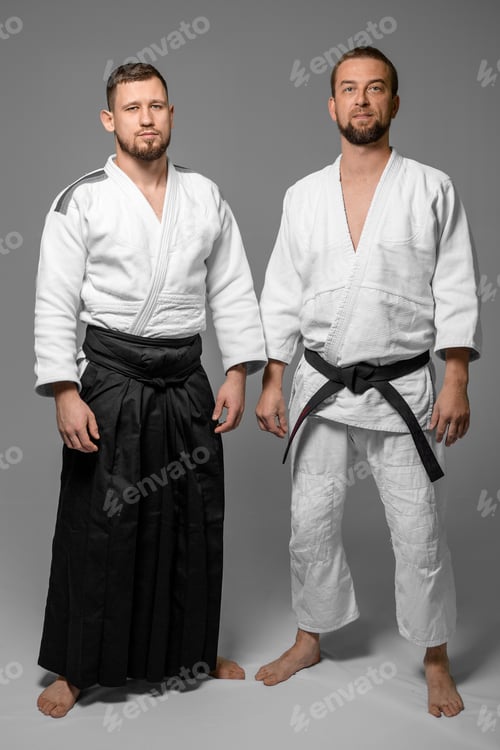 Preview: Two Caucasian Men Are Posing Before Having A Practice Of Aikido