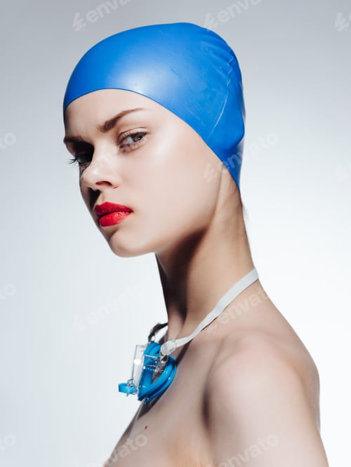 Preview: woman in swimming cap red lips posing professionals