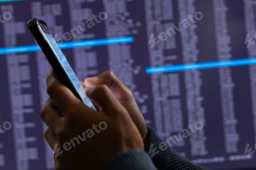 Vista previa: Biracial businessman using smartphone and data processing on grey background