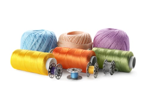 Preview: Color sewing threads on white background