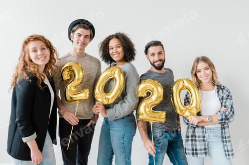 Preview: Group of multicultural friends holding golden balloons in form of numbers