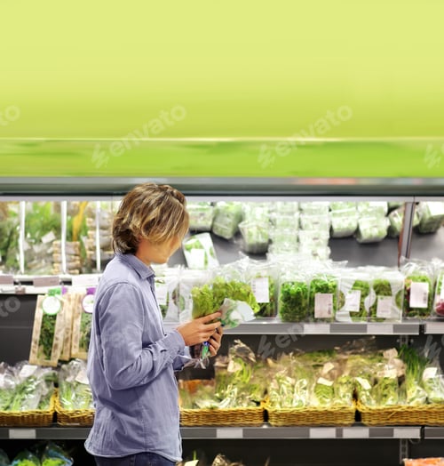 Preview: Young Man Buying Vegetables At The Market