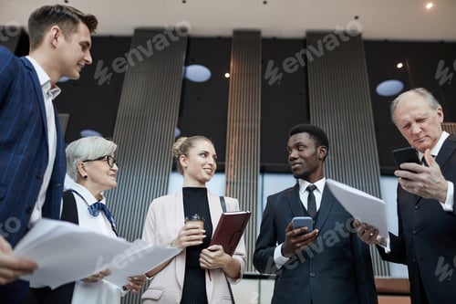 Preview: Business people preparing for meeting