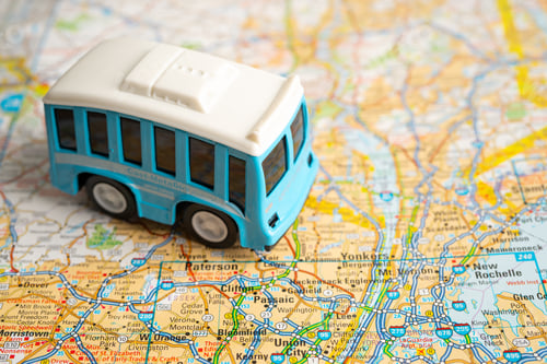 Preview: Bus car vehicle to travel on world map, geography, tourism and exploration concept.