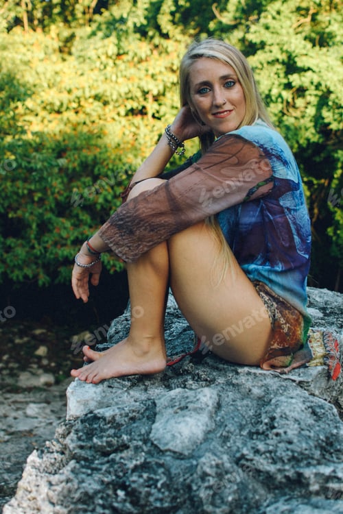 Preview: blonde girl posing in ancient ruins in mexico lifestyle concept