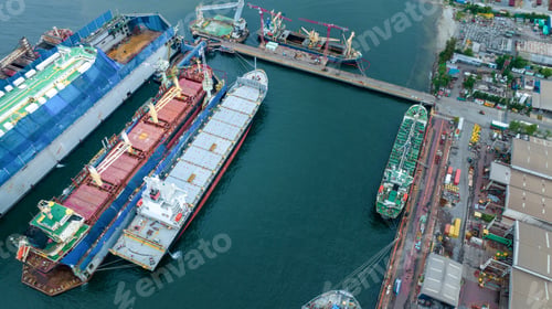 Preview: cargo container ship at dry dock concept maintenance service working in the sea. Insurance and