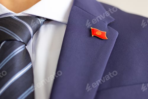 Preview: Kyrgyzstan flag pin on business suit lapel