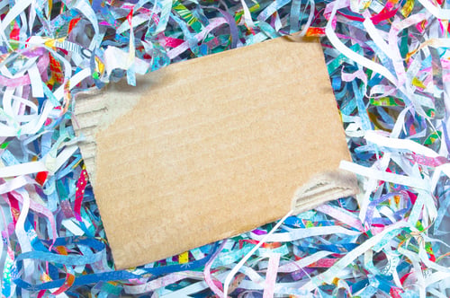 Preview: Closeup shredded paper texture and reuse paper scrap of document with brown paper background.