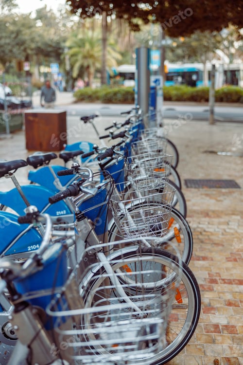 Preview: Group of rental bicycles in city street