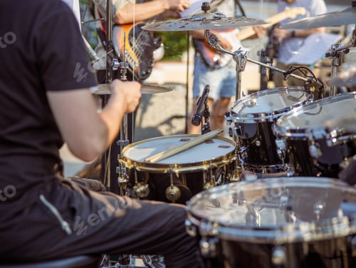 Preview: Man drummer having concert rehearsal on the street