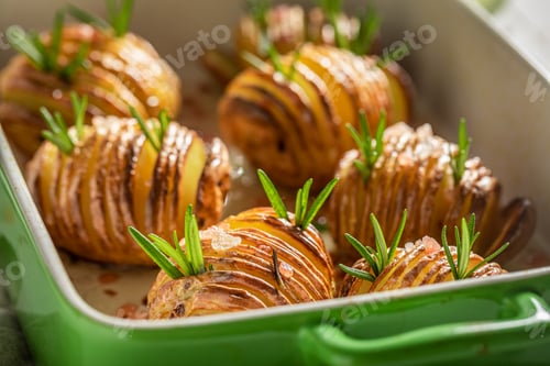 Preview: Homemade baked potatoes with fresh herbs and salt