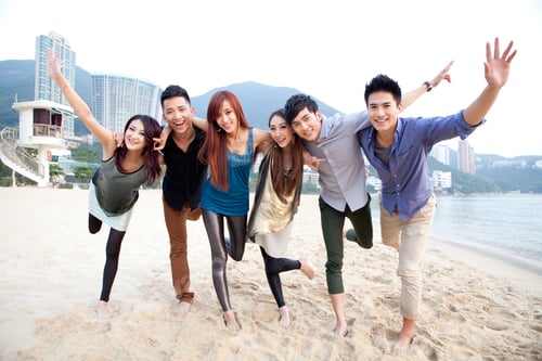 Preview: Happy young people posing on the beach of Repulse Bay, Hong Kong