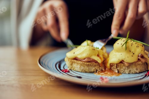 Preview: Close-up of poached eggs on toast, with smoked salmon.