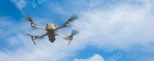 Preview: The UAV drone and photographer man hands. drone copter flying with digital camera.