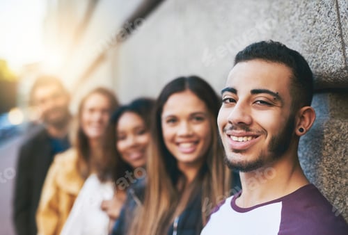Preview: Cropped shot of friends standing together while out in the city