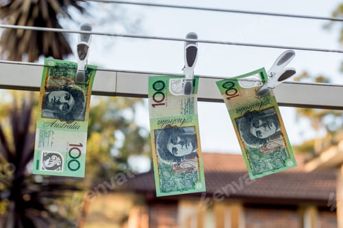 Preview: Australian 100 dollar bank notes hanging out to dry on a clothes line