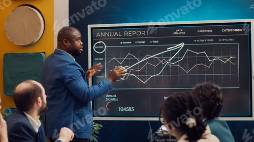 Preview: Project manager analyzing infographics to evaluate supply and demand