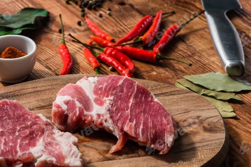 Preview: Two steak with chili and other condiment