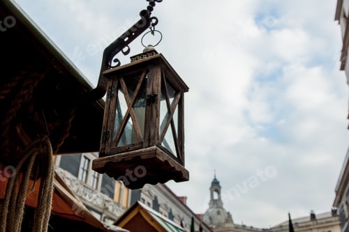 Preview: wooden lamp on street of old germany city