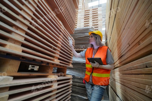 Preview: Industrial factory employee working in wooden manufacturing industry