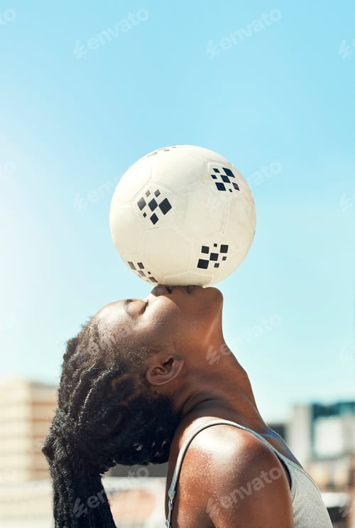 Preview: Soccer, ball and kiss of a black woman head with balance and fitness outdoor for sports. Football,